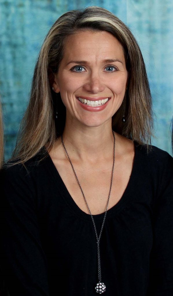Jennifer Michele Coaching wearing a black shirt