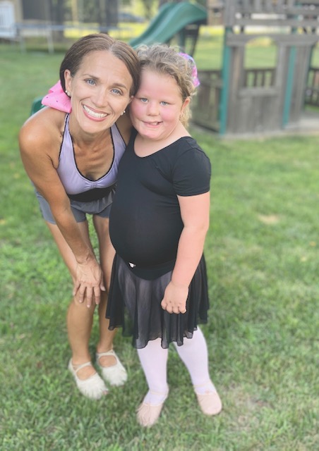 ballet class attire with a ballet teacher