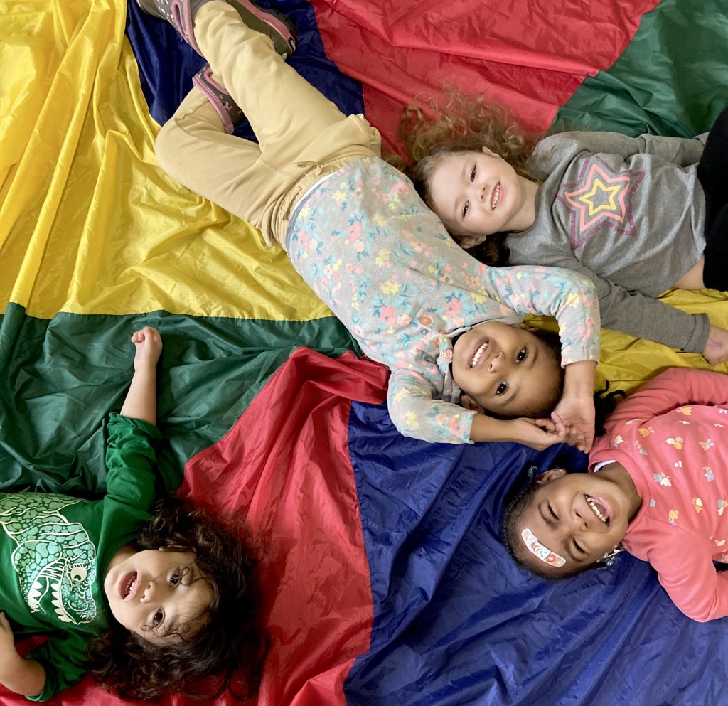 toddler and me dance class on a parachute